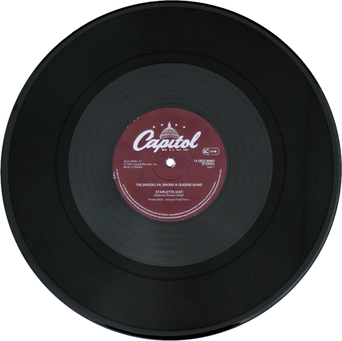 A record rotates on a turntable at 45 rpm.